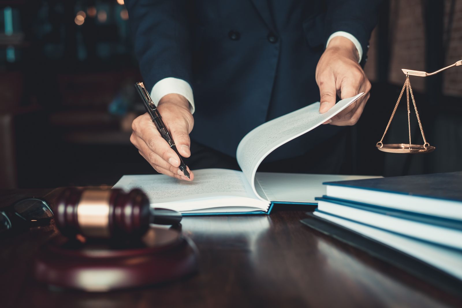 Family Provision Claims Lawyer Working In An Office